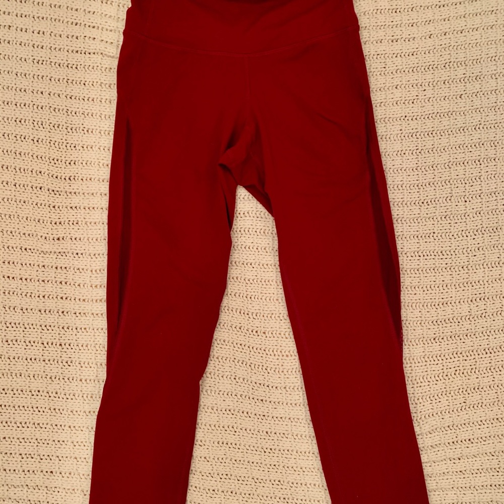 High waisted red leggings with mesh material
